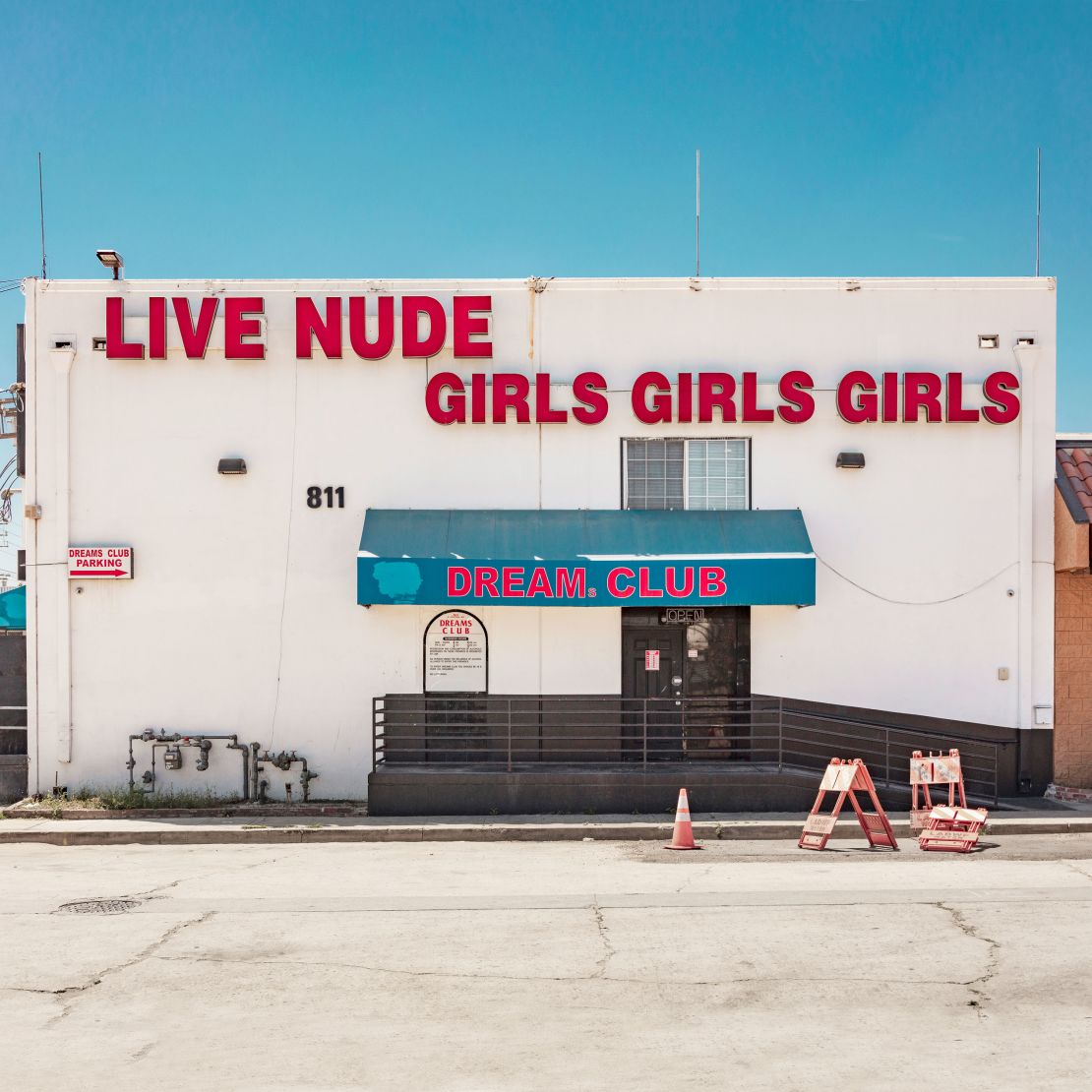 A French photographer offers an unexpected view of the United States through its many strip clubs Dreams Club in Los Angeles, California.
